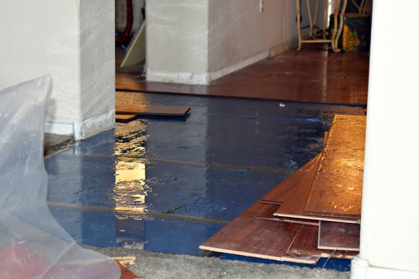 Professional Flood Damage Restoration technician working in Suamico, WI